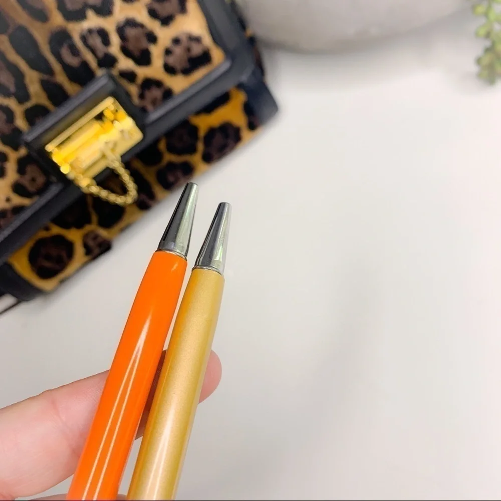 Two New Crystal filled stylus clip on pens black ink orange and gold